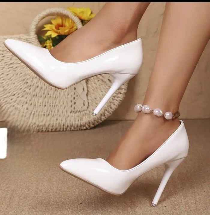 Patent Stiletto Heels β Power, Polish & Pure Glamour